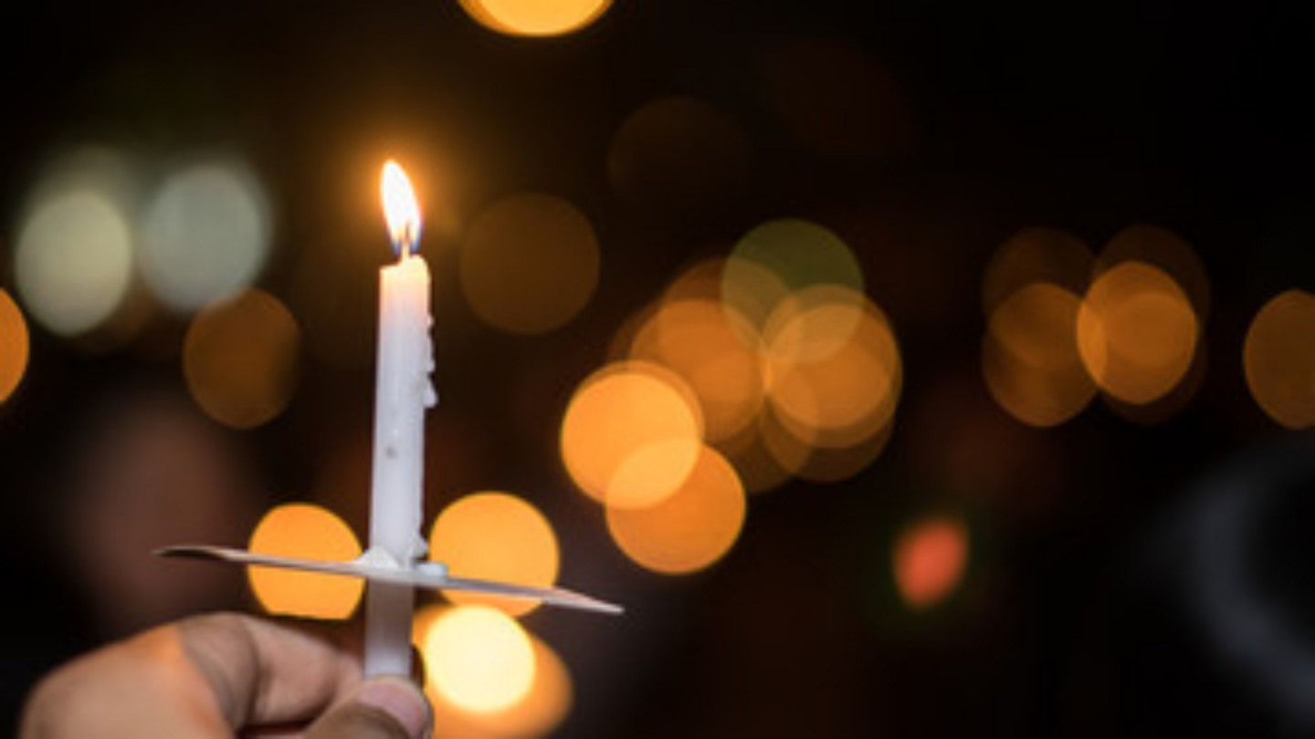 hand with a candle
